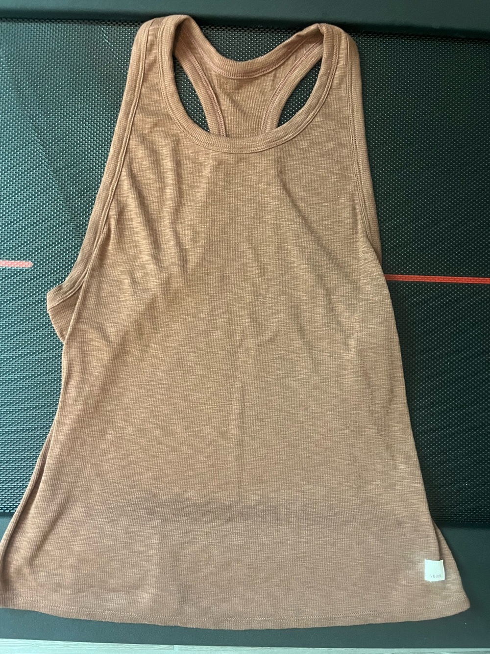 VUORI Sleeveless Racerback Tank Top in rust red